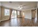 Main bedroom with wood-look floors and access to private bath at 11368 Rancho Portena Ave, Las Vegas, NV 89138