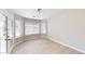 Bright dining area with French doors and a large window at 1311 E Bowler Dr, Pahrump, NV 89048