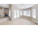 Bright dining area with French doors leading to a patio and large windows at 1311 E Bowler Dr, Pahrump, NV 89048