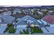 Elevated view of single-story house, two-car garage, and spacious yard at 233 Molly Ct, Las Vegas, NV 89183