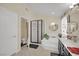 Bathroom with soaking tub, shower, and double sink vanity at 233 Molly Ct, Las Vegas, NV 89183