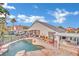 Luxury pool and patio area with a built-in BBQ and outdoor kitchen at 233 Molly Ct, Las Vegas, NV 89183