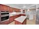 Kitchen with double oven, island, and ample counter space at 2813 Vista Butte Dr, Las Vegas, NV 89134