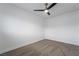 Bright bedroom with ceiling fan and grey carpet at 303 Vallarte Dr, Henderson, NV 89014