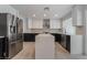 Modern kitchen with stainless steel appliances and an island at 303 Vallarte Dr, Henderson, NV 89014