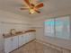 Bright kitchenette featuring white cabinets and wood countertops at 380 E Maulding Ave, Las Vegas, NV 89123