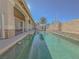 Long swimming pool with stone coping and a spacious deck at 380 E Maulding Ave, Las Vegas, NV 89123