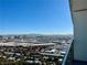 High-rise view of Las Vegas city, featuring mountains in background at 4381 W Flamingo Rd # 3012, Las Vegas, NV 89103