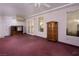 Sunroom with ceiling fan, window views, and pinkish carpet at 553 Eagle St, Mesquite, NV 89027