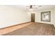 Bright living room featuring hardwood floors and a ceiling fan at 725 Moonlight Mesa Dr, Henderson, NV 89011