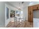 Cozy breakfast nook with white table and chairs at 8800 Sundial Dr, Las Vegas, NV 89134