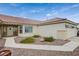 Front entry with walkway and landscaping at 9520 Twelve Pins Dr, Las Vegas, NV 89129