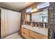 Bathroom with double vanity, shower and walk-in closet at 11016 Rossi Ave, Las Vegas, NV 89144