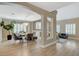 Elegant dining room with modern chandelier and hardwood floors at 11154 Grants Landing Ct, Las Vegas, NV 89141