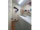 Convenient laundry room with washer, dryer, and shelving at 11177 Deluna St, Las Vegas, NV 89141