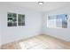 Spacious bedroom with large windows and light wood floors at 2670 Palma Vista Ave, Las Vegas, NV 89121