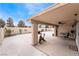 Covered patio with seating area and exercise bike at 3111 Johannan Ln, North Las Vegas, NV 89032