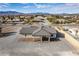 Aerial view of the home's backyard, showcasing the expansive patio and mountain views at 3551 Ravine Ave, Pahrump, NV 89048