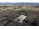 Wide aerial view showing the property, neighborhood, and mountain backdrop at 3551 Ravine Ave, Pahrump, NV 89048