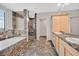 Elegant bathroom with marble flooring, double vanity, and soaking tub at 360 E Desert Inn Rd # 1201, Las Vegas, NV 89109