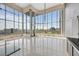 High-ceiling living area with floor-to-ceiling windows offering scenic views at 360 E Desert Inn Rd # 1201, Las Vegas, NV 89109