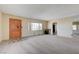 Living room featuring wood floors and a brick fireplace at 3809 San Bernardino Ave, Las Vegas, NV 89102