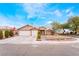 Single-story house with a two-car garage and well-maintained landscaping at 4318 Red Blanket Rd, North Las Vegas, NV 89032