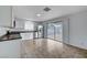 Bright kitchen with stainless steel appliances and tiled floor at 4605 Shoen Ave, Las Vegas, NV 89110