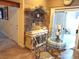 Elegant dining area featuring an ornate glass-top table and a decorative buffet at 5438 Cholla Cactus Ave, Las Vegas, NV 89141