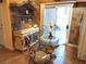 Kitchen with glass-top table and ornate hutch at 5438 Cholla Cactus Ave, Las Vegas, NV 89141