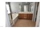 Bathroom with double sinks, bathtub and shower at 6554 Roundstone Bog Ave, Las Vegas, NV 89139