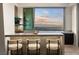 Wet bar with city views, perfect for entertaining at 661 Ridgestone Rim Ct, Henderson, NV 89012