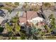 Two story house with solar panels, pool, and lush landscaping at 7501 Bachelors Button Dr, Las Vegas, NV 89131