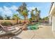 Resort-style pool with a spa and lounge chairs at 7501 Bachelors Button Dr, Las Vegas, NV 89131