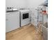 Bright laundry room, features washer, dryer, and folding rack at 889 Adair Grove Ln, Las Vegas, NV 89138