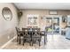 Bright dining area with table and chairs, view to backyard at 9218 Brayden Bay St, Las Vegas, NV 89178