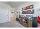 Bedroom with guitar storage, record display, and cabinet at 10152 Midnight Onyx St, Las Vegas, NV 89141