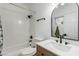 Clean bathroom with a shower/tub combo and updated vanity at 2108 Grand Island Ct, Las Vegas, NV 89117