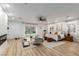 Main bedroom with sitting area, fireplace, and large windows at 2108 Grand Island Ct, Las Vegas, NV 89117