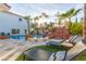 Relaxing poolside patio with lounge chairs at 2108 Grand Island Ct, Las Vegas, NV 89117