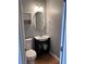 Small bathroom with single vanity and updated toilet at 2570 Velez Valley Way, Henderson, NV 89002