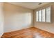 Bedroom with wood floors and plantation shutters at 2968 Panorama Ridge Dr, Henderson, NV 89052