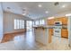 Spacious kitchen with light wood cabinets, granite counters, and island at 2968 Panorama Ridge Dr, Henderson, NV 89052