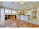 Open living area with hardwood floors and kitchen island view at 2968 Panorama Ridge Dr, Henderson, NV 89052