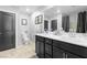 Double vanity bathroom with modern fixtures at 3562 Pontesei Ln, Henderson, NV 89044