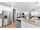 Modern kitchen with stainless steel appliances and granite countertops at 3562 Pontesei Ln, Henderson, NV 89044