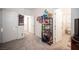 A bedroom with built in shelving and access to a full bathroom at 3746 Bright Aquarius Ln, Henderson, NV 89052