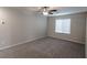 Well lit bedroom with carpet and window blinds at 4538 Solitude Falls Ave, North Las Vegas, NV 89084