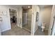 Modern bathroom with shower, toilet, and walk-in closet at 4717 S Maddington Ct, Pahrump, NV 89061