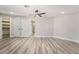 Bright bedroom with ceiling fan, double door closet and wood-look floors at 491 Kristin Ln, Henderson, NV 89011